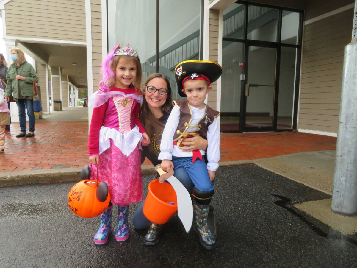 Savannah Bleakney, 5, is dressed as Sleeping Beauty, left, and is with her mother, Michelle, and brother, Brady, 3, who is a pirate.