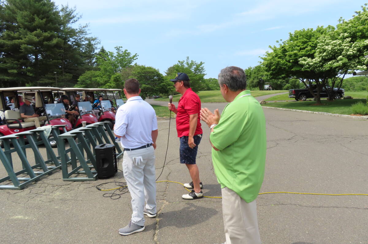 Jim Weinberg, in red, managing director of Clarksons Platou, was the title sponsor of the golf tournament.