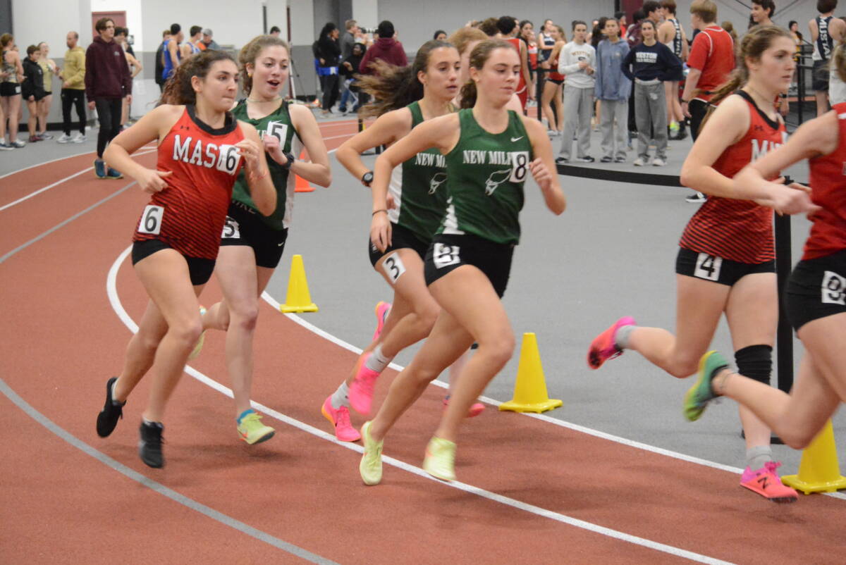 Ashley Colberg and Erin Davis compete in a race.