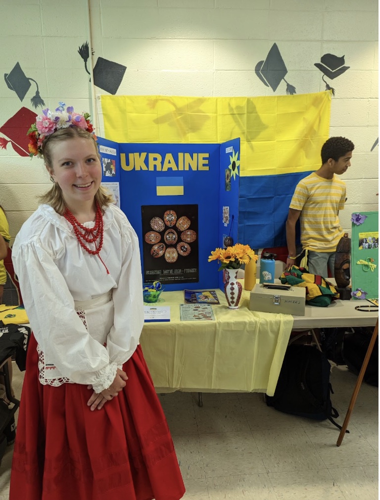 Emily Barnhart, a freshman, sold bracelets to support Ukraine at her booth.