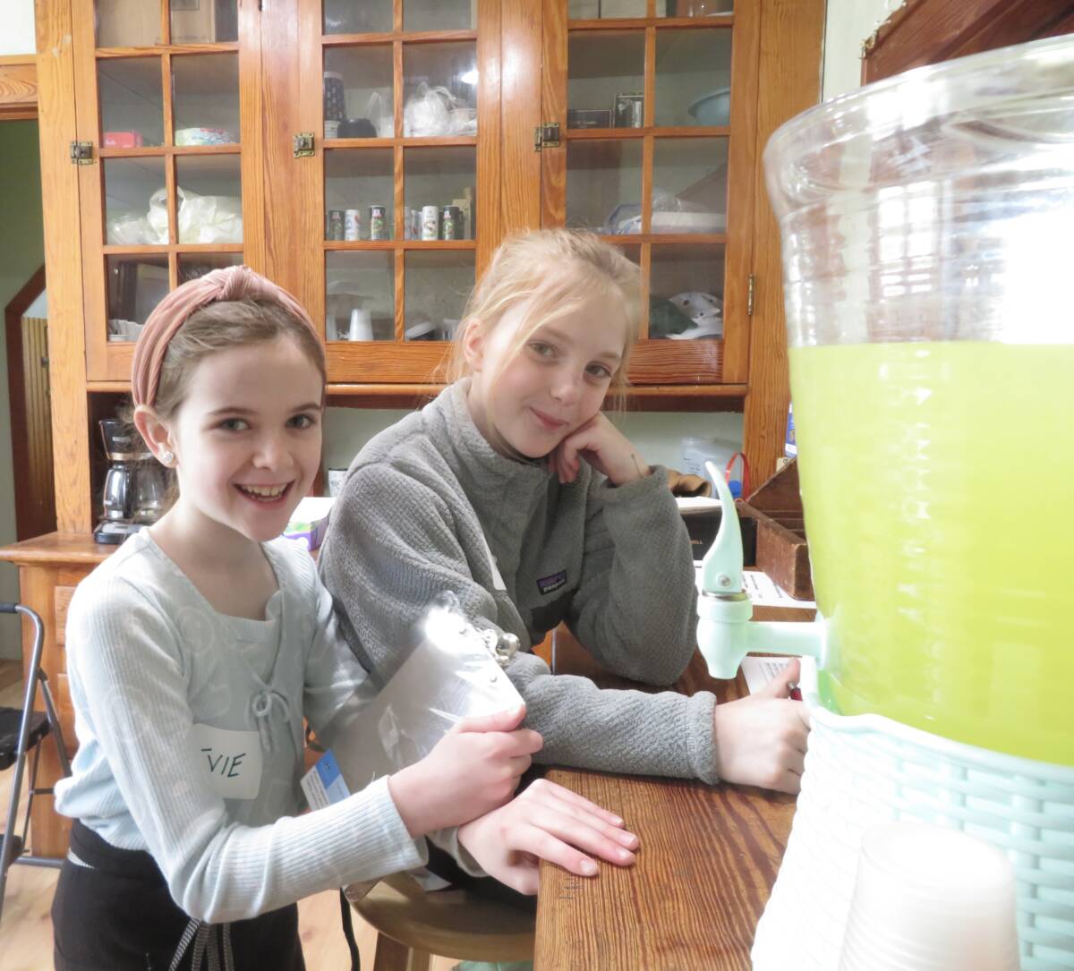 Evie McLaren, 9, left, took orders from customers and Maddie Ritter, 10, rang them up.