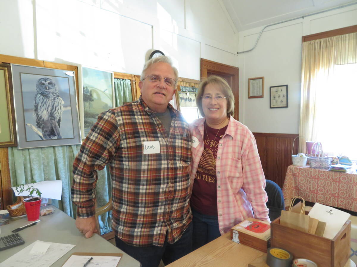 David Turner, left, and his wife Karen volunteer at the tag sale.