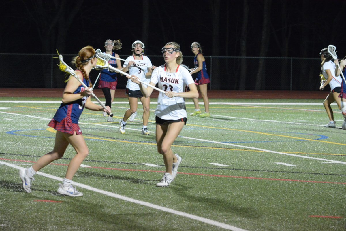 Bailey Bajda defends.
