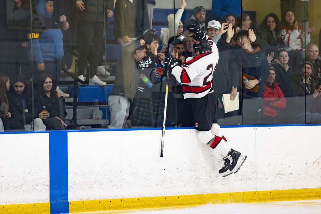 Luke Kondub celebrates a goal during a game this winter. Kondub recorded a hat-trick against Branford and scored in a 6-3 win over Woodstock Academy. Photo by Robert DeSanto