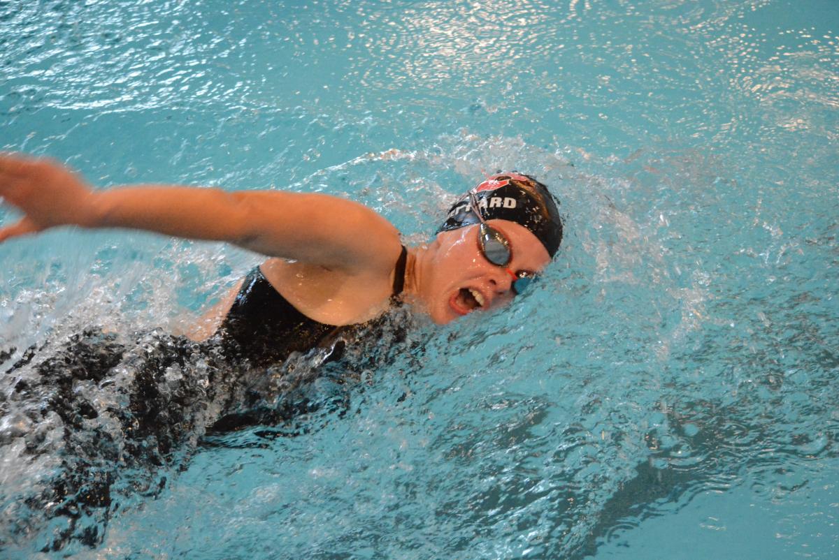 Grace Sheppard races in the 50 yard freestyle event.