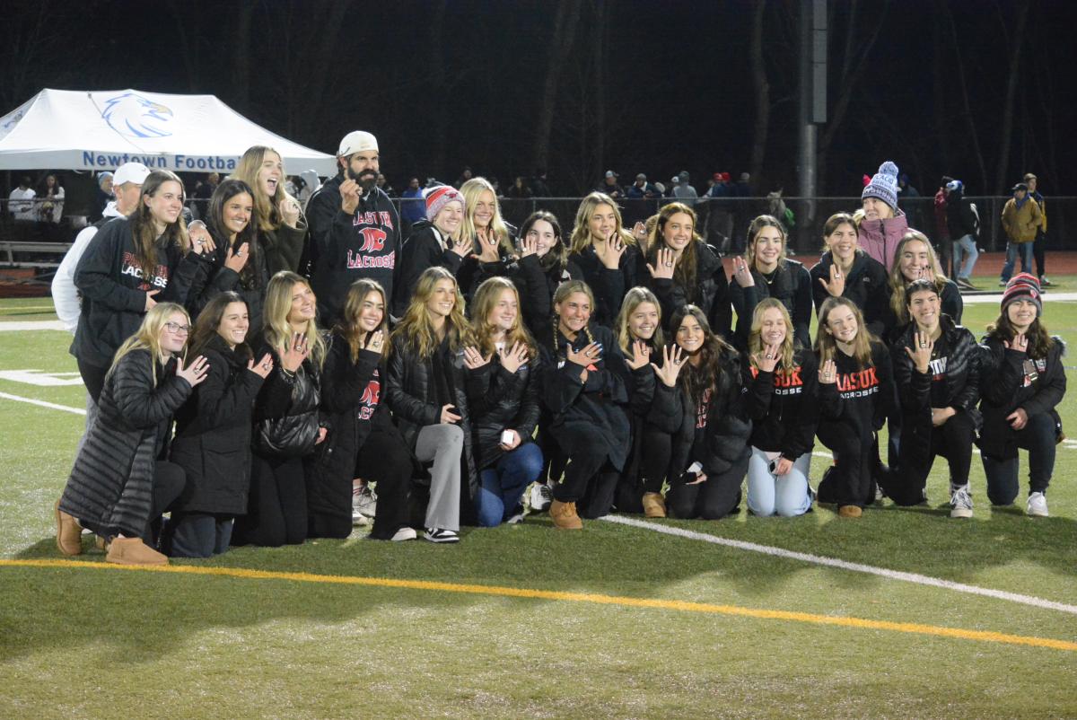 Masuk Girls Lacrosse team receives its rings.