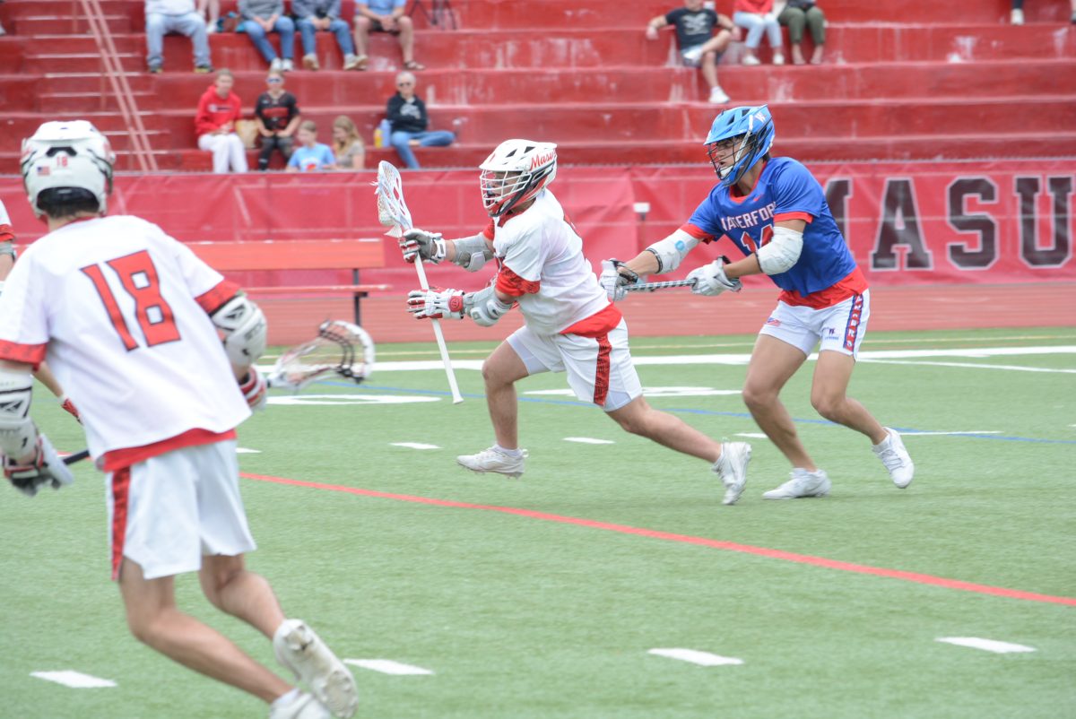 Michael Benedetto pulls away from an opposing player to set up a goal.