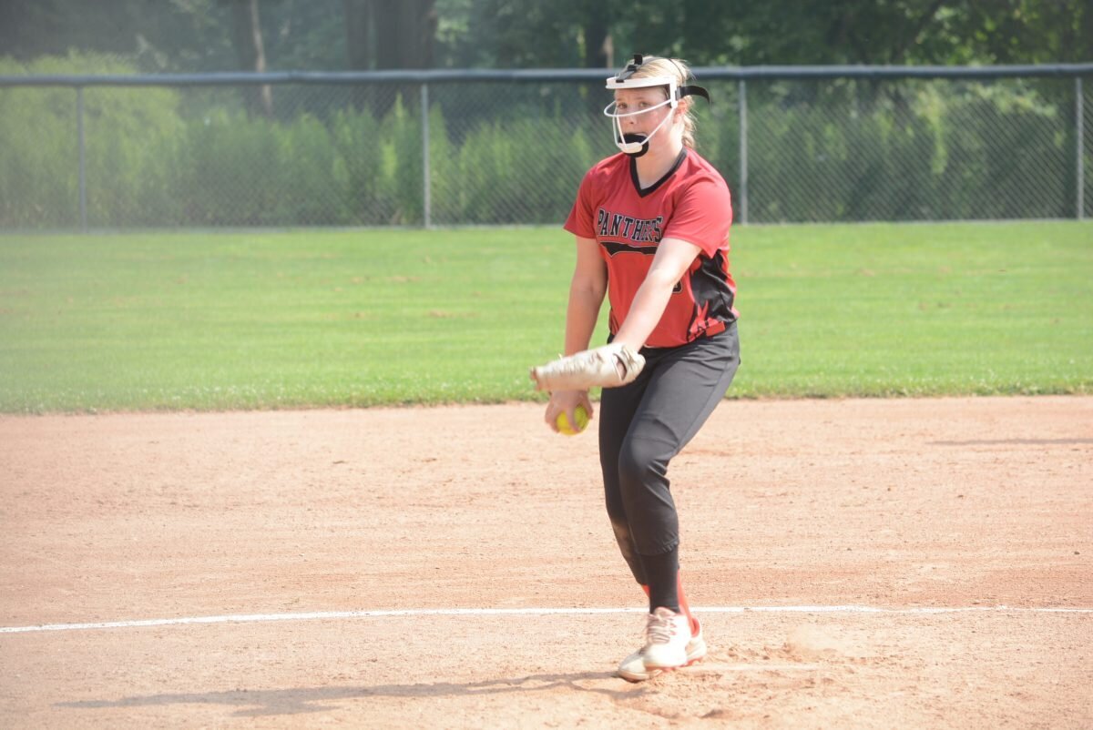 Paige Embry delivers to home plate.