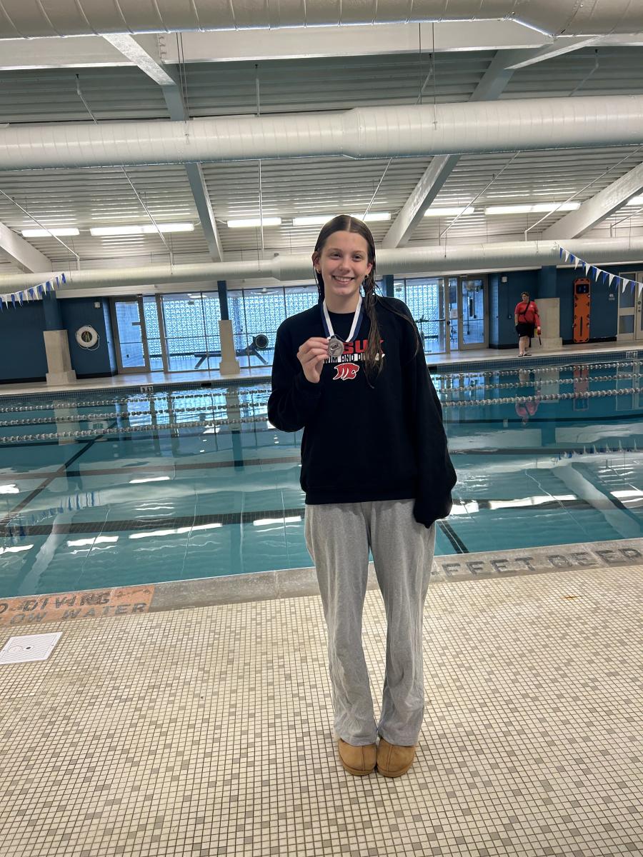 Lena Savkovic was second in the backstroke race, earned All State and set a Masuk record.