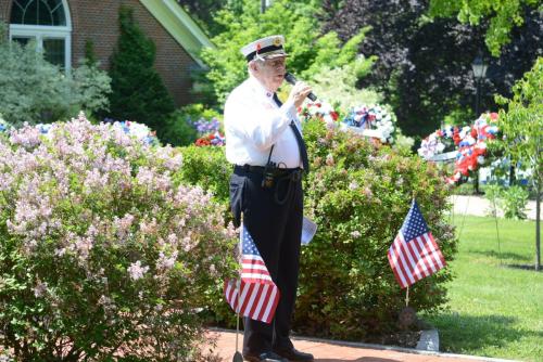 Dave York, the fire department chaplain, speaks during the Memorial Day Ceremony Sunday.