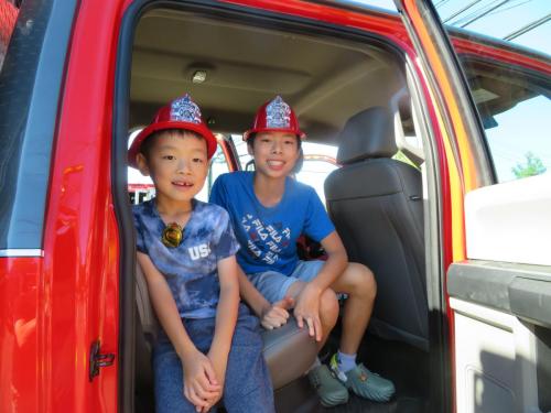 Brothers, from left, Eden, 6, and Jordan Yang, 12, of Monroe.