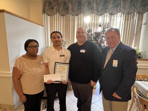 Kimberly, Wilfredo and Will Uquillas and Monroe Chamber President Ray Giovanni